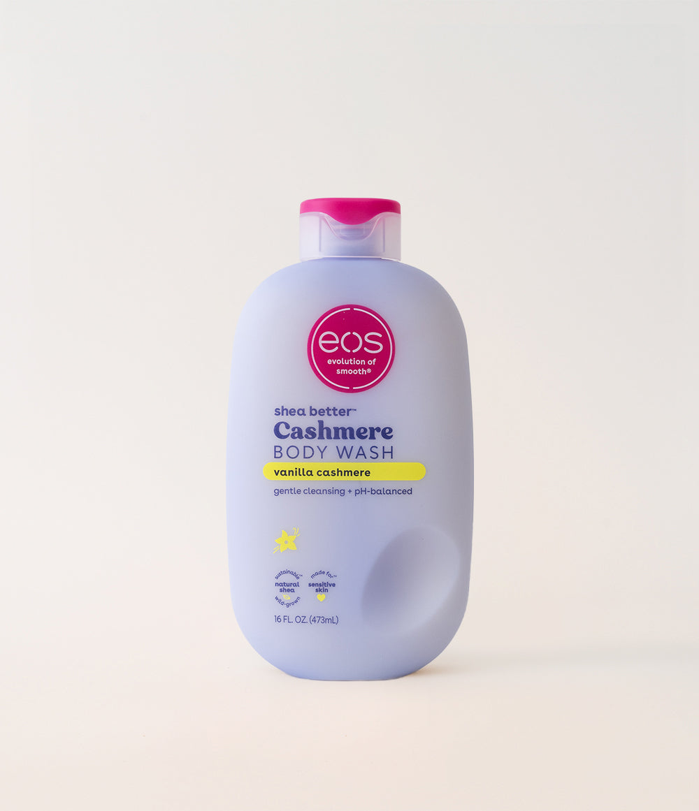 A bottle of EOS Vanilla Cashmere Body Wash with a pink cap on a white background.